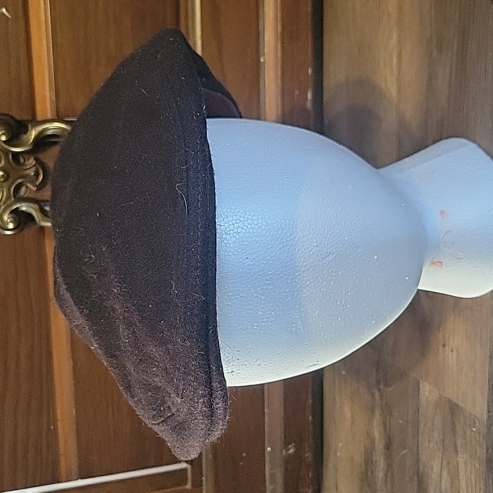 2 news boy style hats